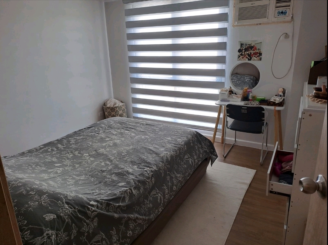Second bedroom with single bed and study area