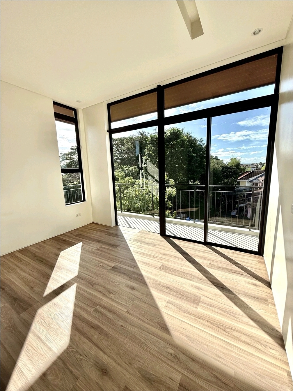 Bedroom with wide sliding doors to a terrace