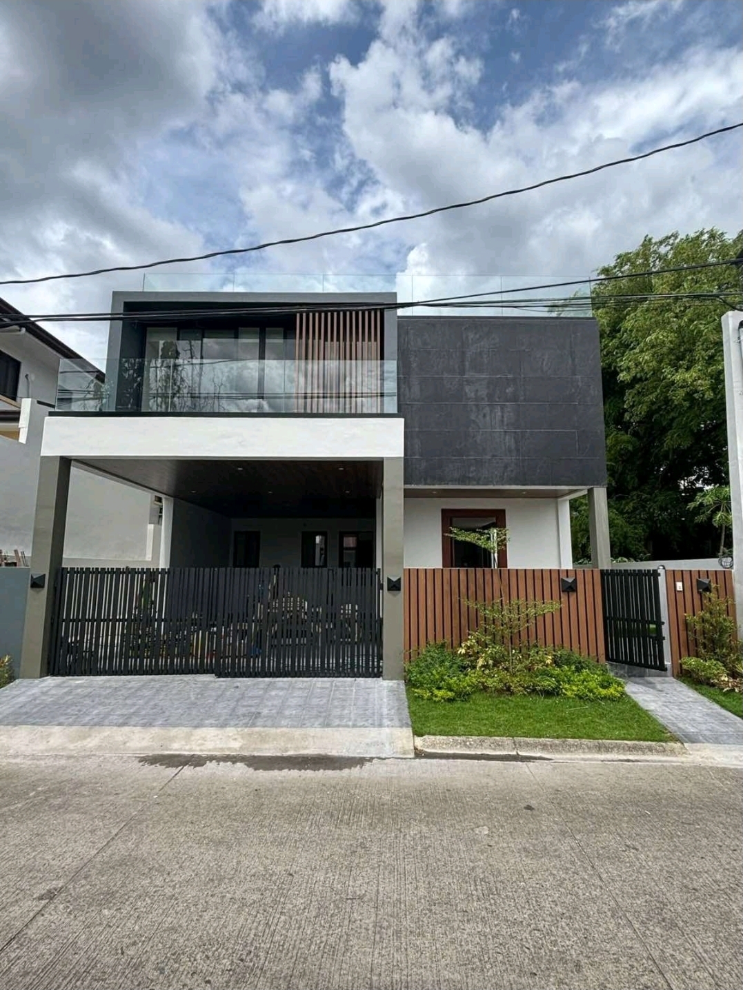 Modern three-storey facade in the NSHA enclave of BF Homes, Parañaque