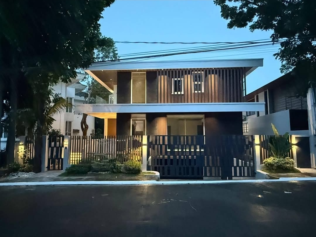 Newly renovated modern home in Hillsborough, Alabang at dusk